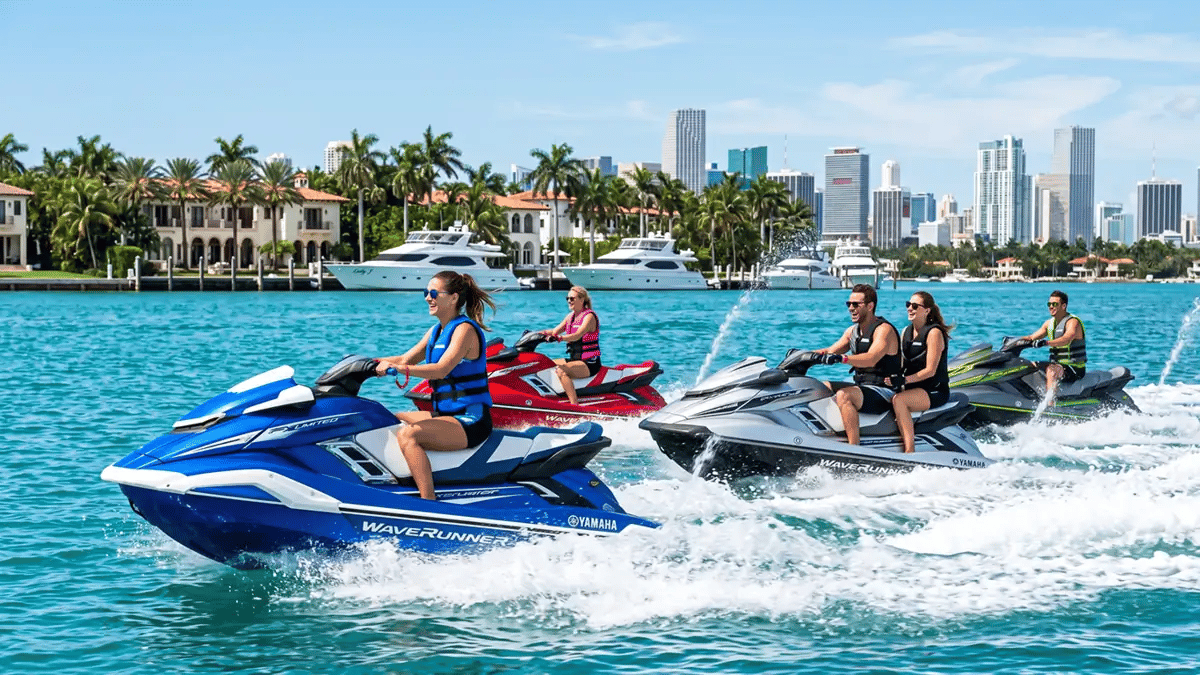 Jet ski riders on Biscayne Bay with the Miami skyline behind them