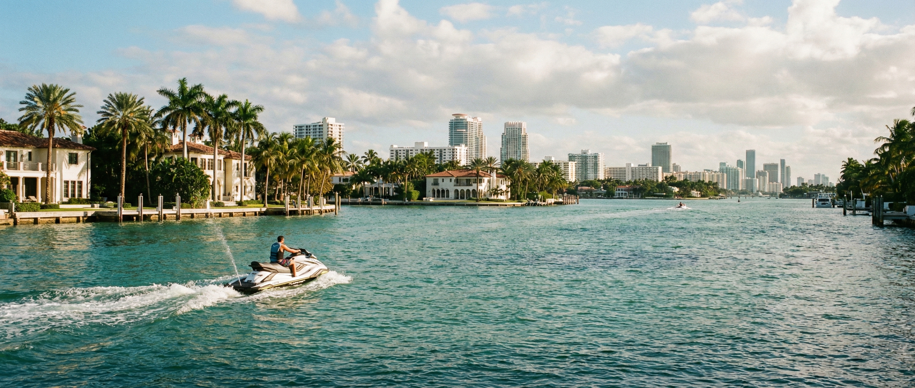 Jet ski rider riding a 2024 Yamaha exploring around Miami Beach waterways